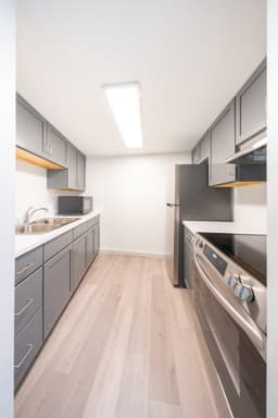 Gally kitchen, grey, stove.